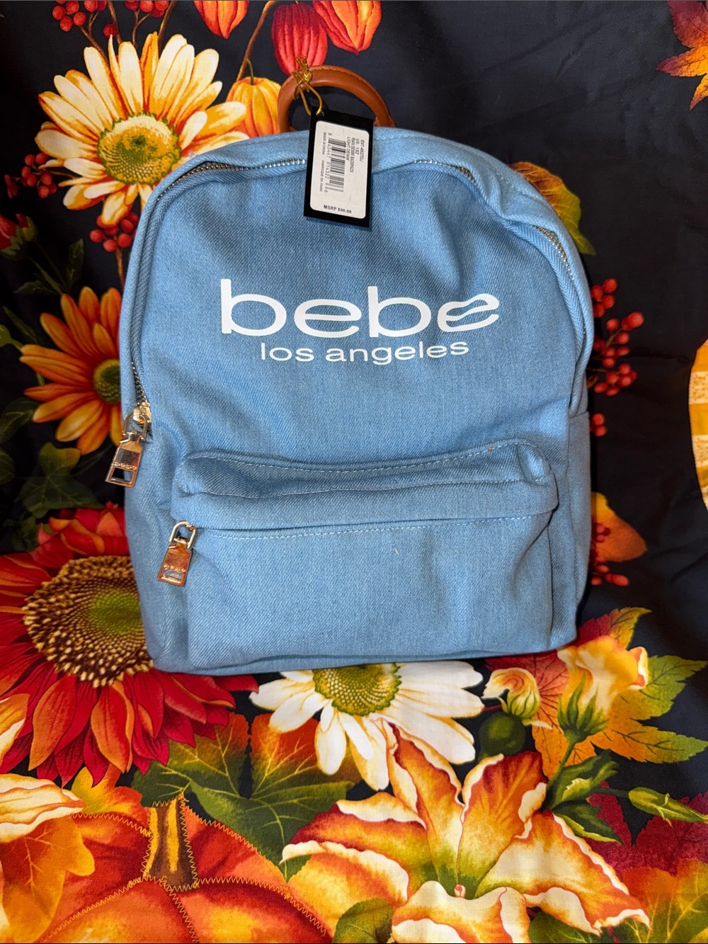 bebe Light Blue denim Mini Backpack with Front Pocket